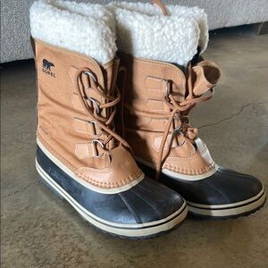 Sorel Tan and Black Winter Boots